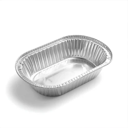 Oval-shaped disposable aluminum foil baking pan with ridged sides, empty and placed on a white background.